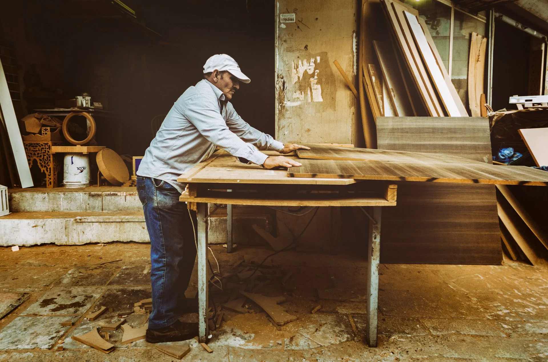Carpenter at work in a joinery workshop