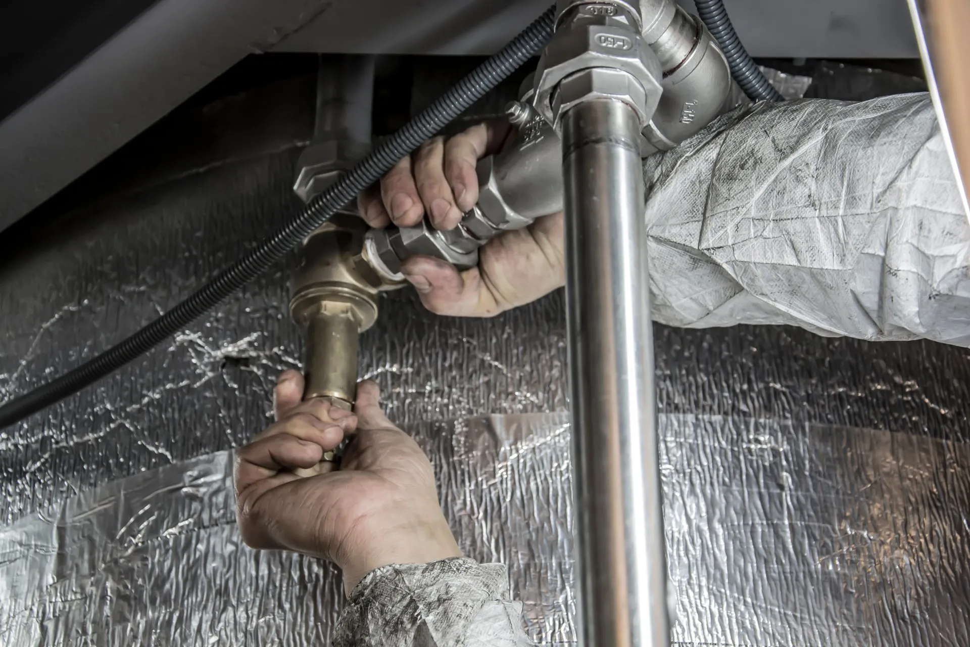Plumber fitting brass and steel pipework